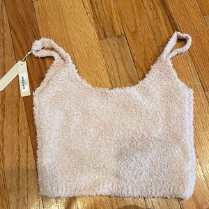 SKIMS - color is Dusk which is like a soft pink - brand new with tags